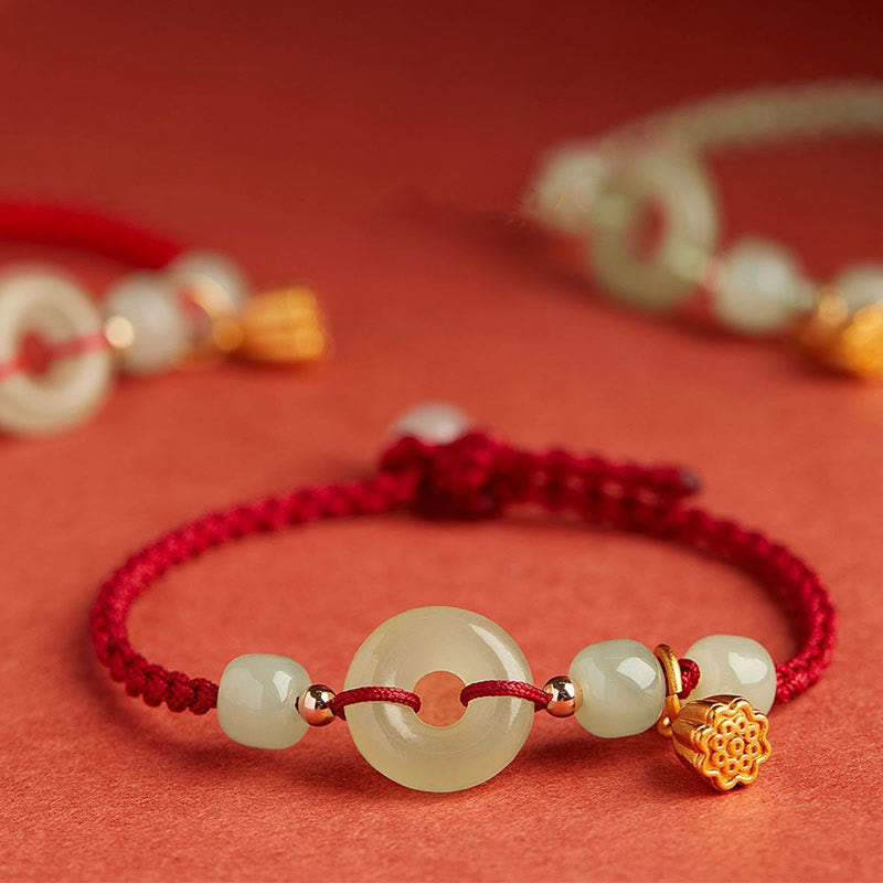 Jade Peace Buckle Lotus Bracelet – front view showing jade bi disc and translucent beads on crimson cord, Prosperity