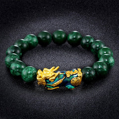 FengShui PiXiu Jade Bracelet – green jade bracelet gold PiXiu on dark textured background, protection jewelry