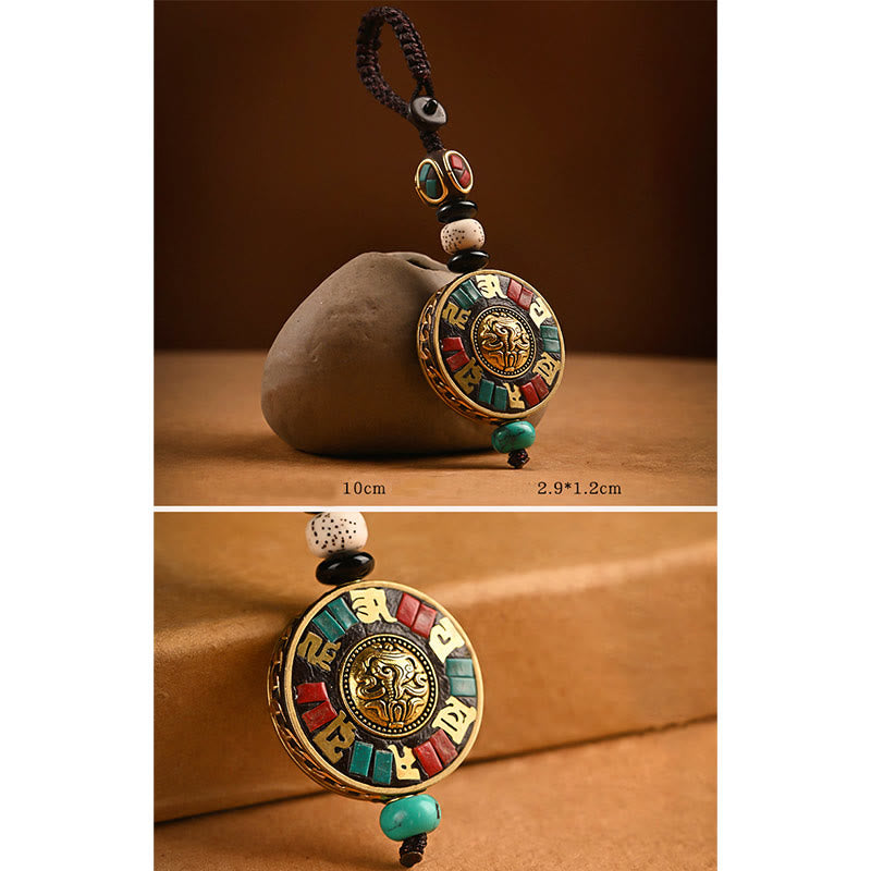 Tibetan Bodhi Seed Peace Key Chain – Gold Om medallion with turquoise coral inlay on braided cord, amulet pendant