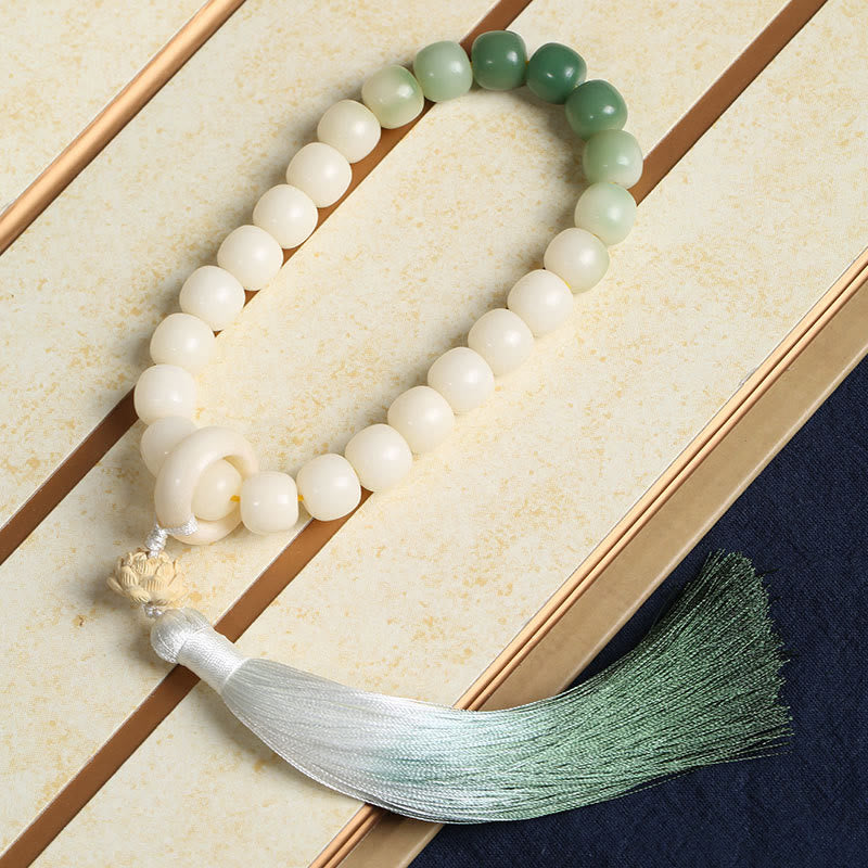 Bodhi Seed Lotus Wisdom Wrist Mala – Bracelet in luxury gift box with gold trim, ombre beads and silk tassel, premium packaging