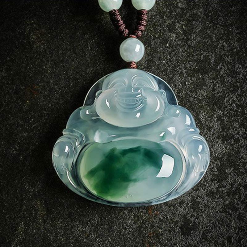Cyan Jade Buddha Luck Necklace Pendant – front view with twin jade beads and brown woven cord on granite, balance