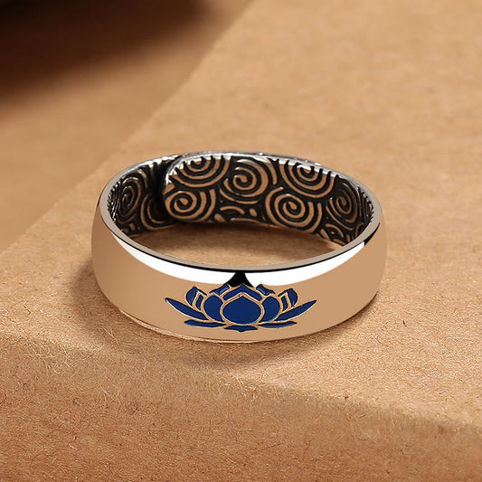 Tibetan Blue Lotus Enlightenment Ring - Angled view revealing blue lotus face and oxidized spiral interior, spiritual ring