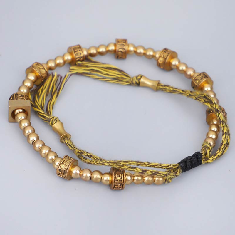 Tibetan Gold Om Mani Padme Hum Bracelet – Curved gold beaded design with antique finish, prayer beads