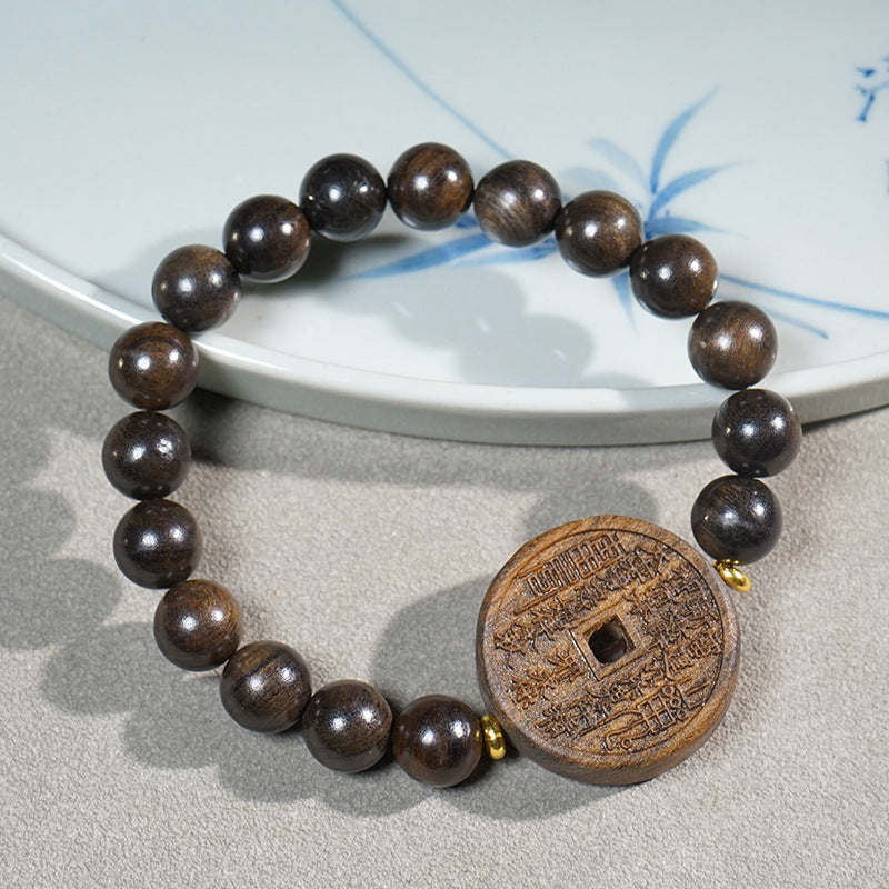 Natural Agarwood Carved Mala Bracelet, lifestyle shot, healing bracelet