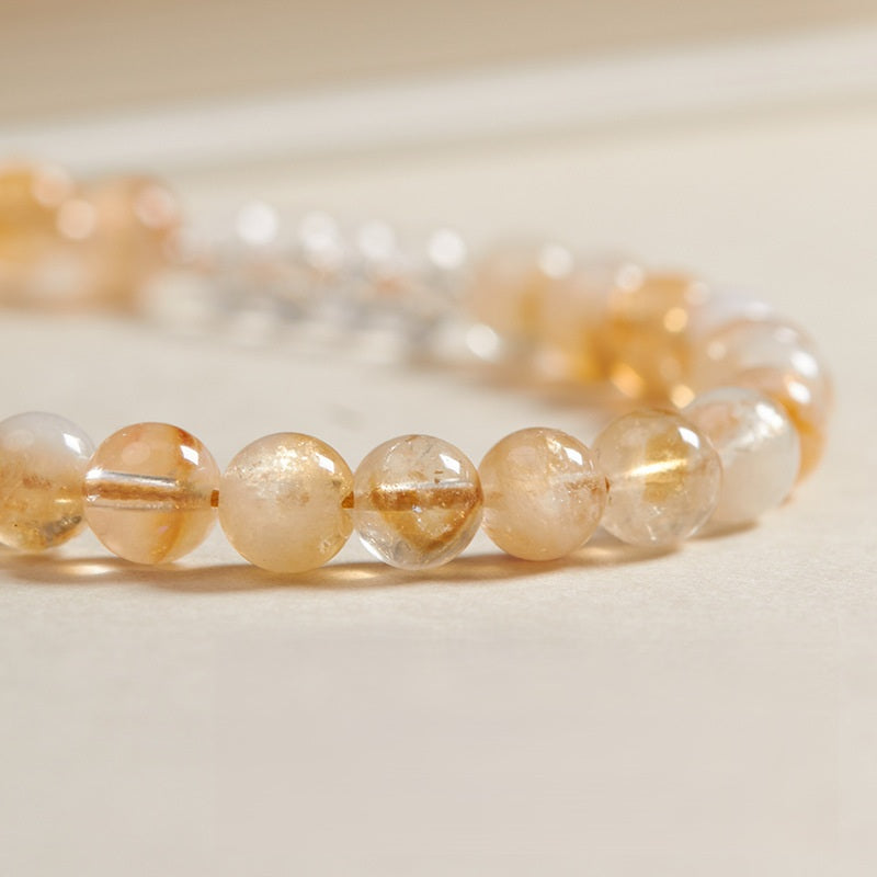 Yellow Quartz Citrine Phone Charm & Wristband, angled view