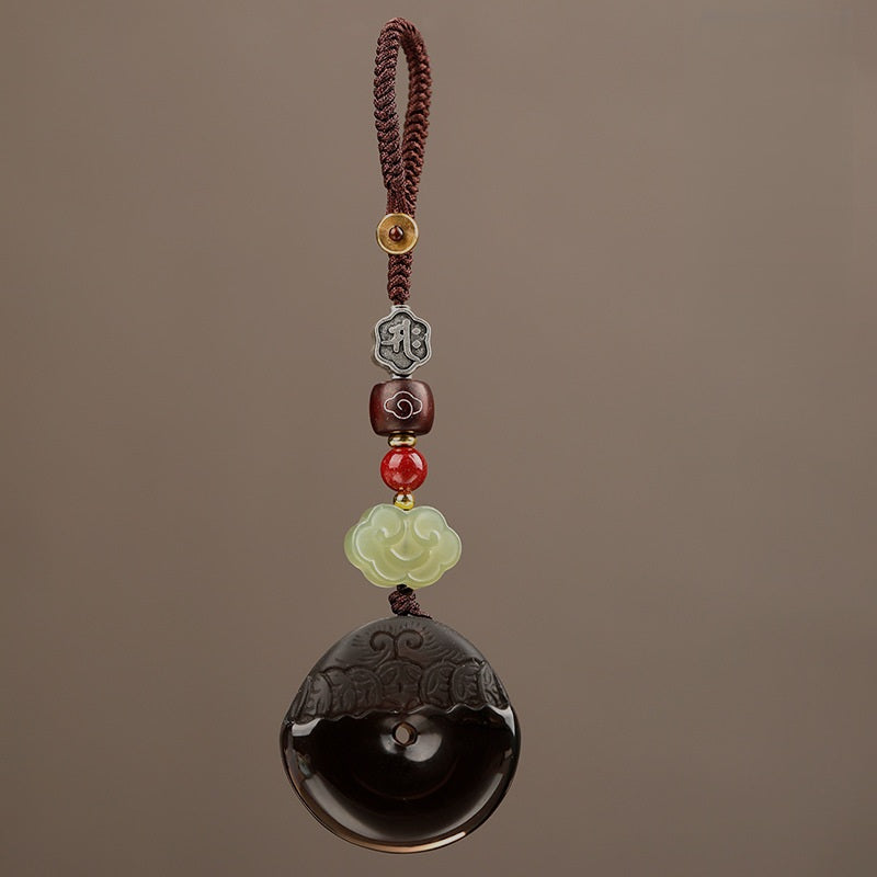 Pixiu Keychain – vertical hanging view of ice obsidian disc with carved Pixiu on cord