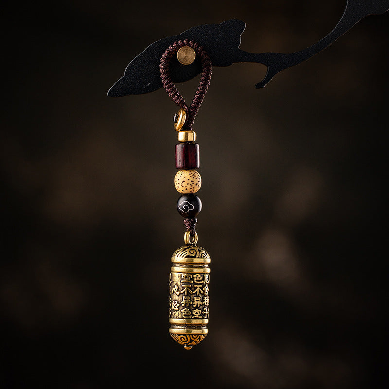 Tibetan Om Mani Padme Hum Brass Car Ornament, close-up detail