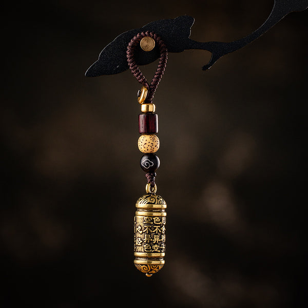 Tibetan Om Mani Padme Hum Brass Car Ornament, close-up detail