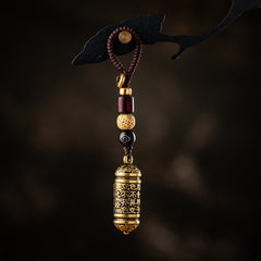 Tibetan Om Mani Padme Hum Brass Car Ornament, close-up detail