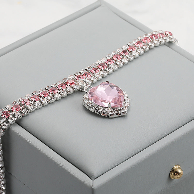 Crystal Pet Collar – Pink rhinestone band with heart pendant on gray box, rose gold tone pet gift