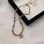 Sunflower Necklace – beaded tiger eye necklace with turquoise accents on linen fabric, gold sun pendant charm, boho jewelry