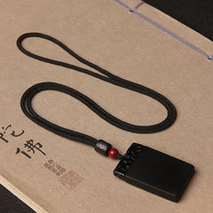 Black Obsidian Pendant – Black obsidian plaque pendant with black cord on calligraphy paper, spiritual jewelry