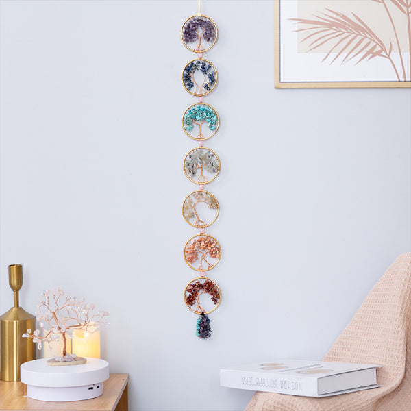 Chakra Tree of Life – seven crystal tree wall hanging in living room with plants, energy healing decor