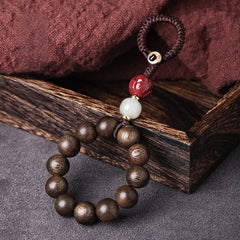 Agarwood & Hetian Jade Lotus Car Keychain, close-up detail, lucky charm