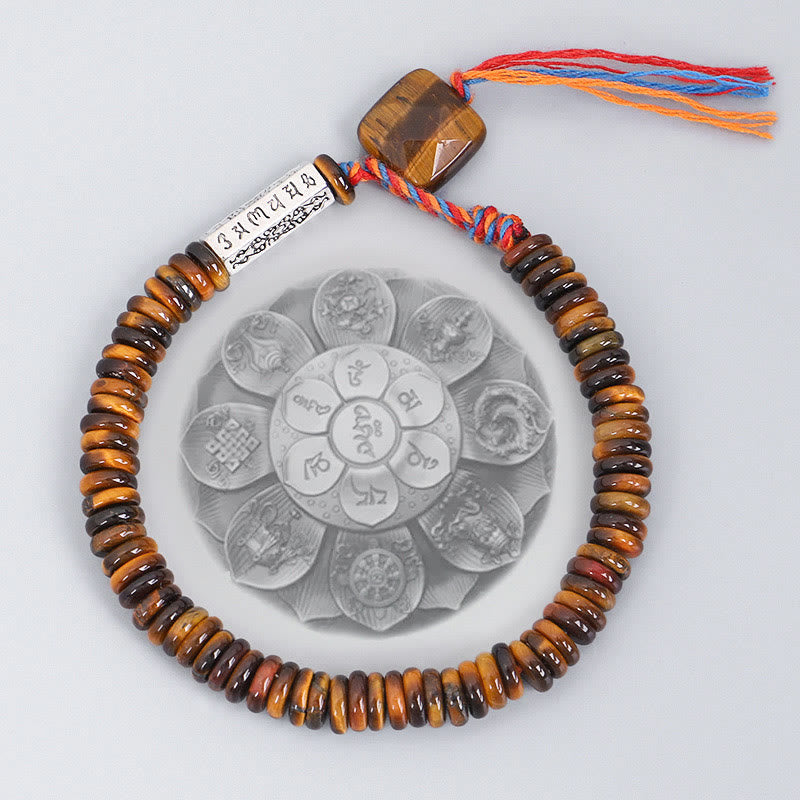 Tiger Eye Om Mani Padme Hum Bracelet - overhead view with guru bead on mandala prop