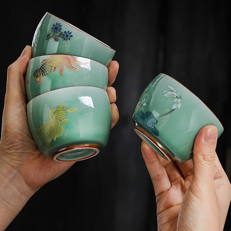 Butterfly Koi Teacup – lifestyle scene with tea pouring into 120ml cup, Chinese tea
