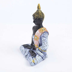 Tibetan Buddha Resin FengShui Decoration – side profile of seated Buddha statue showing detailed robe patterns, resin craft, spiritual home decor