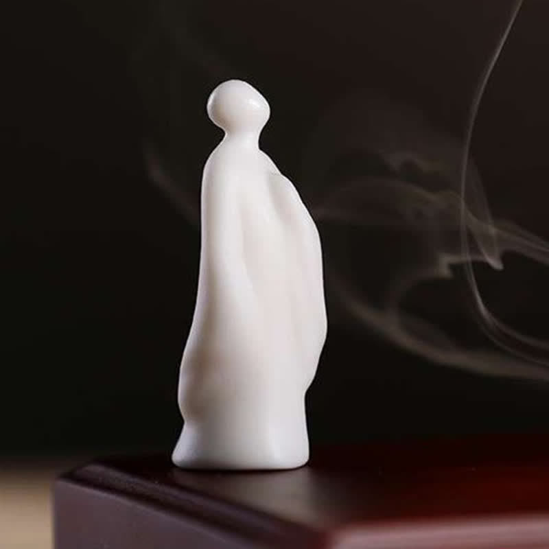 Tibetan Lotus Ceramic Incense Burner – low-angle view with flowing sleeve and warm lighting, Blessing