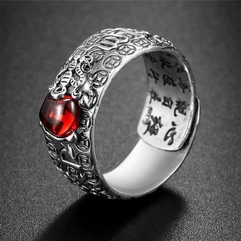PiXiu Red Garnet Wealth Ring – Side view showing engraved Chinese characters inside band, feng shui jewelry Main image