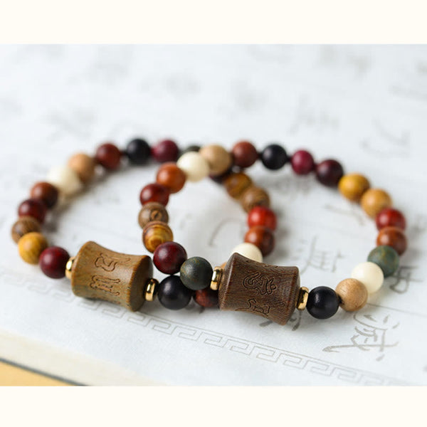 Multicolored Sandalwood Prayer Bracelet – Overlapping pair at 45-degree angle, stacked bracelet set