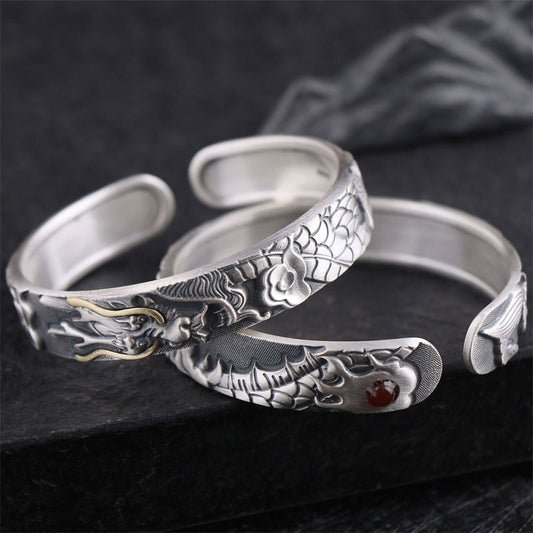 Sterling Silver Dragon Bracelet Pair – Two-tone cuffs with red stone and dragon pearl motif, Strength