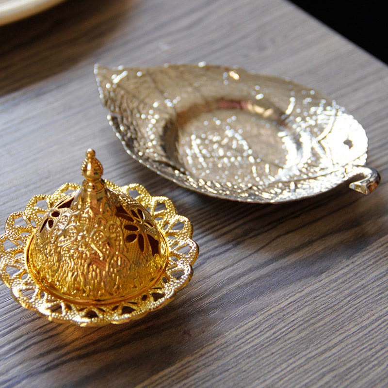 Tibetan Gold Leaf Coaster Incense Burner – Two gold pieces domed lid and leaf tray on wood grain, brass home decor