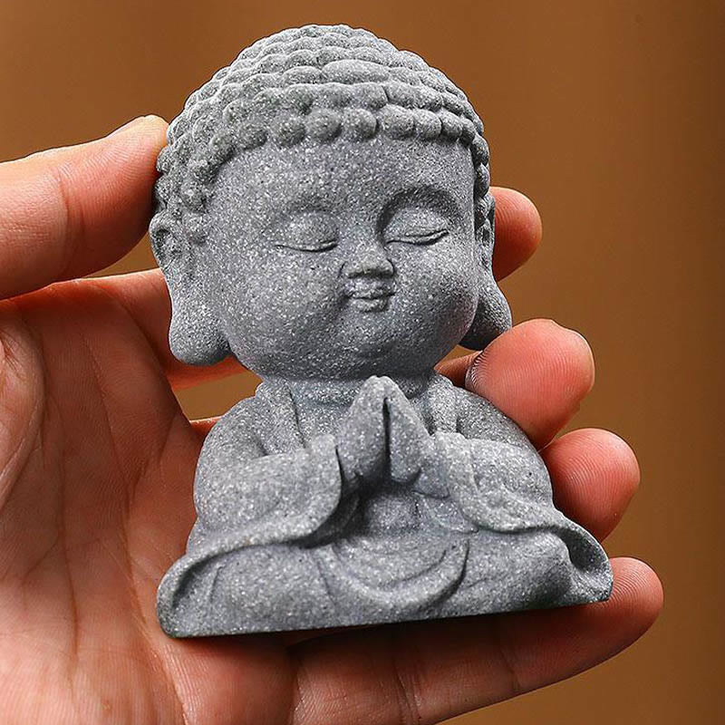 Meditation Praying Buddha Statue – rear view of folded robe lines carved in stone, back detail