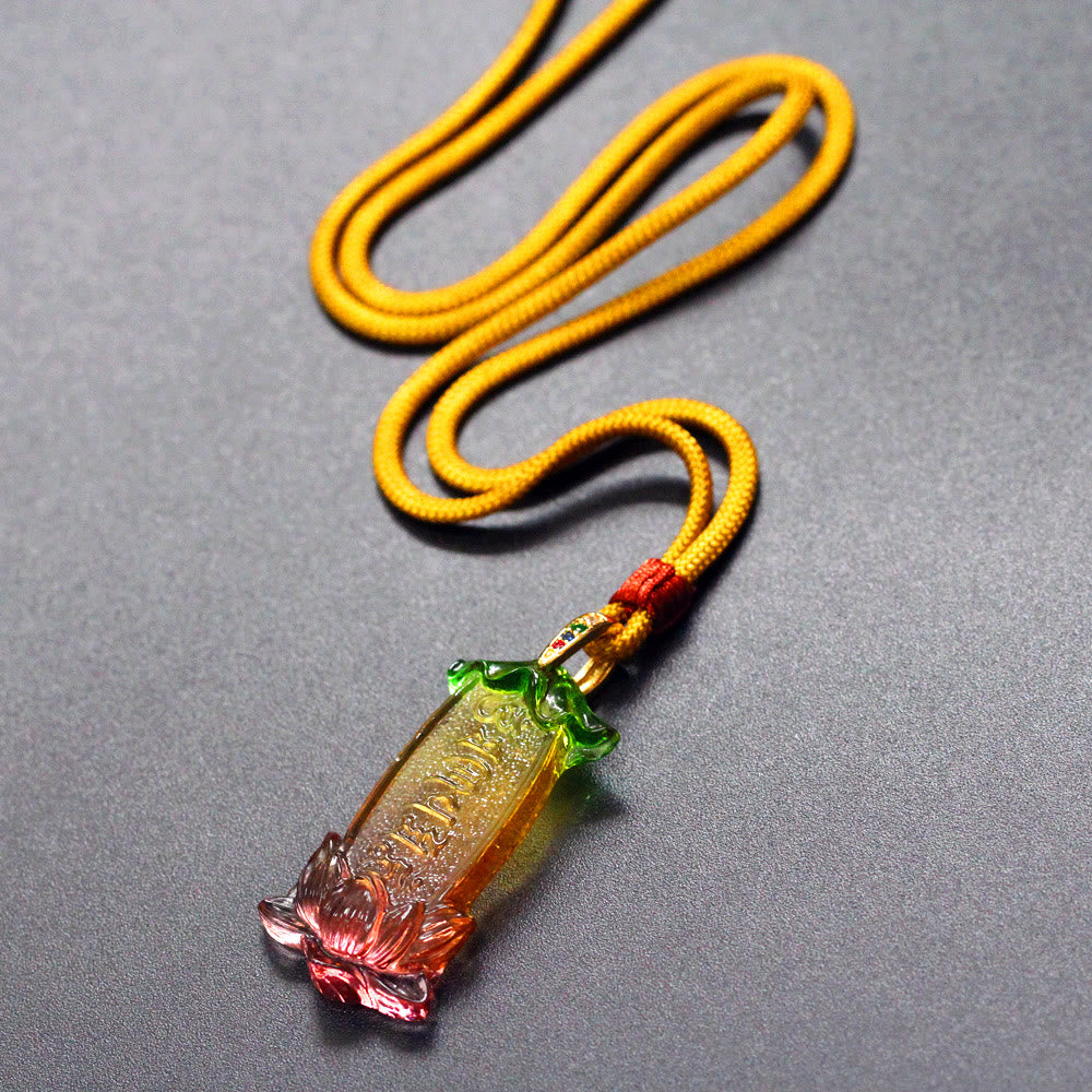 Buddha Liuli Lotus Necklace – close-up of six-character mantra relief on liuli surface, zen accessory