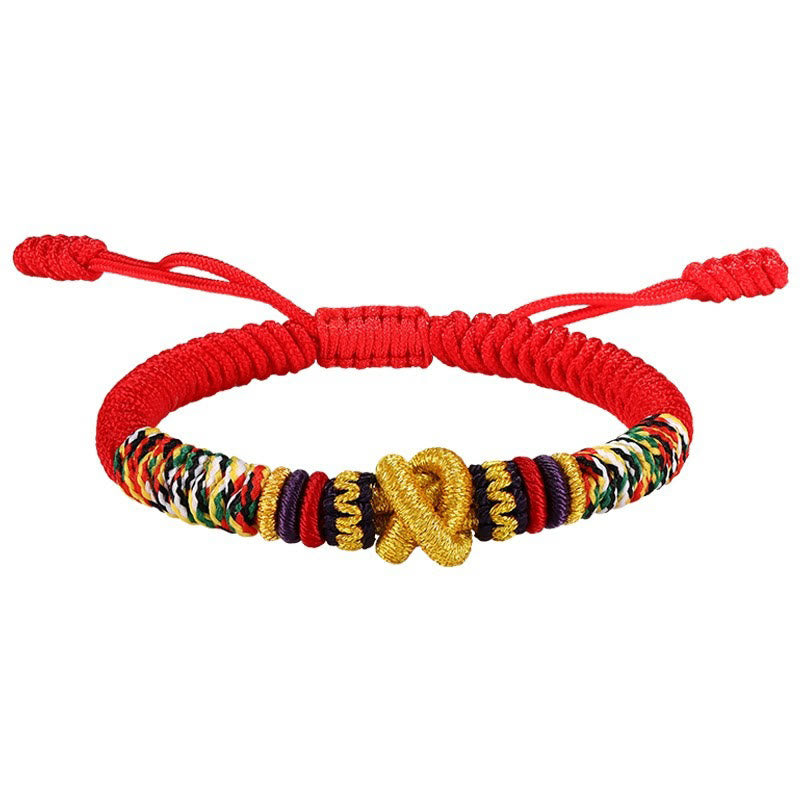 Tibetan Mantra Bracelet – White background front view with gold knot and adjustable sliding closure, macrame