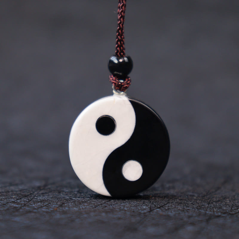 Black Obsidian White Turquoise Yin Yang Strength Fulfilment Necklace Pendant - Front view obsidian turquoise yin-yang amulet 