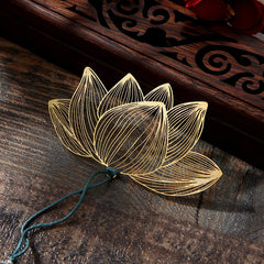Lotus Brass Hollow Bookmark - etched gold lotus on dark wood with carved box, artisan craft