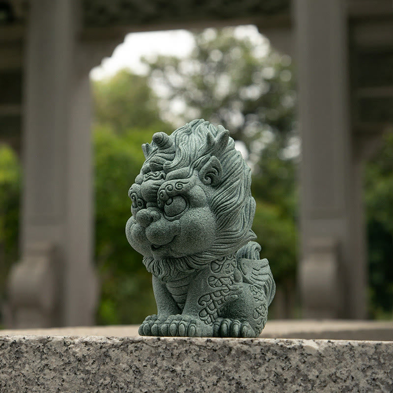 PiXiu Sandstone Statue – Side view on granite ledge with garden pillars and greenery, home accent