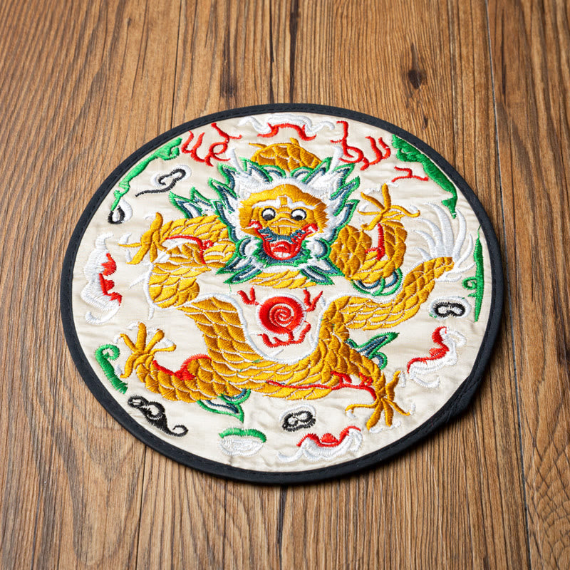 Dragon Embroidery Tea Cup Coaster Mat - cream base frontal dragon with flaming pearl overhead shot, cultural heritage