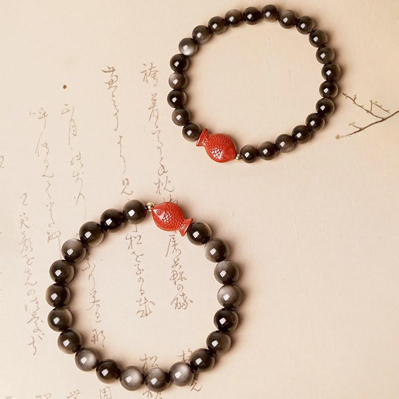 Silver Sheen Obsidian Bracelet – macro of obsidian iridescent flash, cinnabar koi fish detail