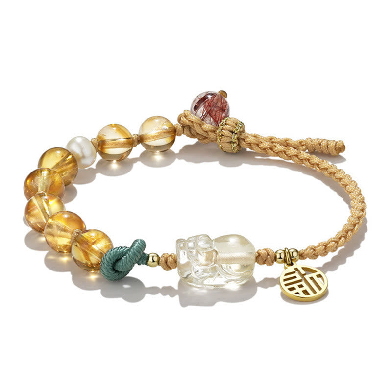 Citrine PiXiu Fu Bracelet – Citrine bead bracelet with clear PiXiu on white backdrop