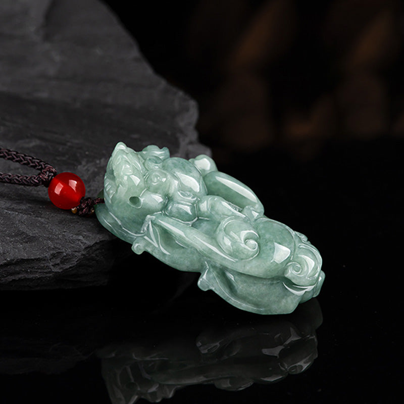 Jade PiXiu Necklace – Side profile light green jade Pixiu with red agate on dark stone, luck charm