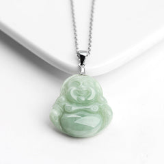 Jade Laughing Buddha Blessing Necklace – white ceramic dish display, frontal view, soft studio lighting, blessing