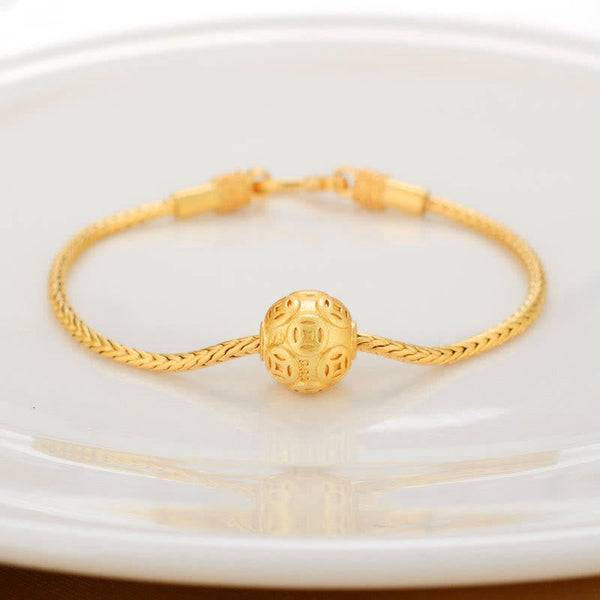 18K Gold Om Mani Padme Hum Koi Fish Bracelet – gold bracelet with pierced openwork geometric bead, filigree cut-out design, white ceramic