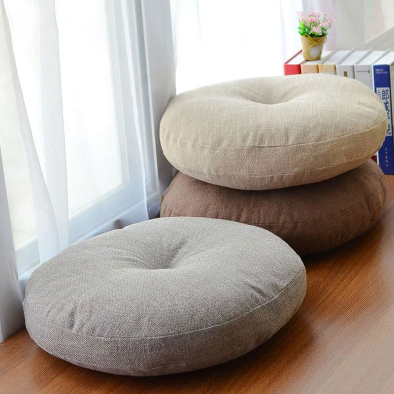 Lotus Linen Meditation Cushion – Three neutral tones by window with potted plant