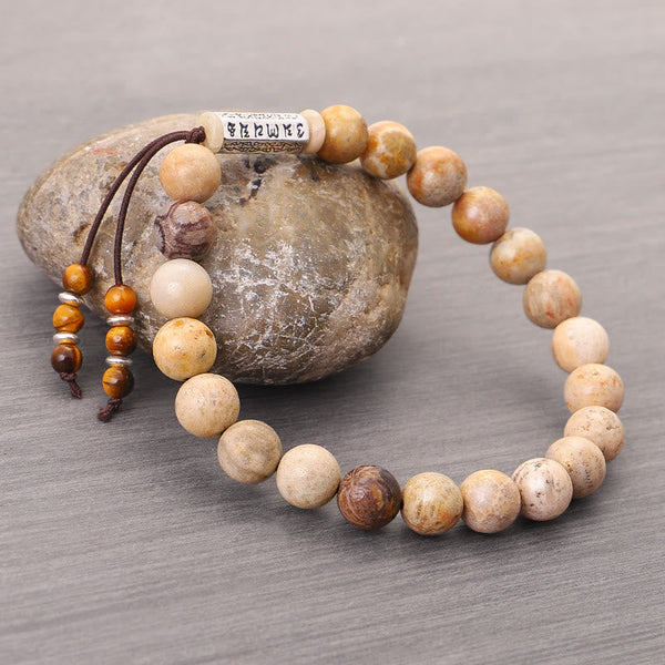 Weathered Stone Om Mani Padme Hum Bracelet – jasper beads with Om Mani Padme Hum charm on river stone, zen jewelry