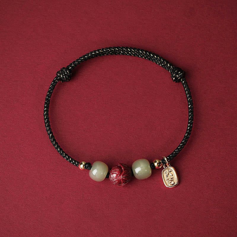 Hetian Jade Cinnabar Lotus Bracelet – Black cord with gold threading and cinnabar lotus bead, black bracelet