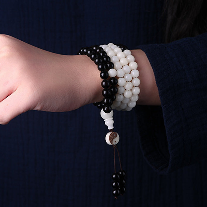 Ebony Yin Yang Protection Mala - dual beaded bracelets on wrist with yin-yang, energy bracelet