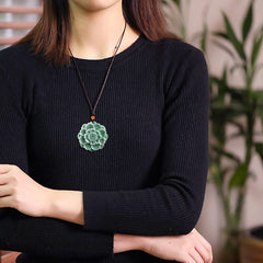 Jade Lotus Pendant Necklace – worn on model in black sweater showing carved jade pendant, Elegant