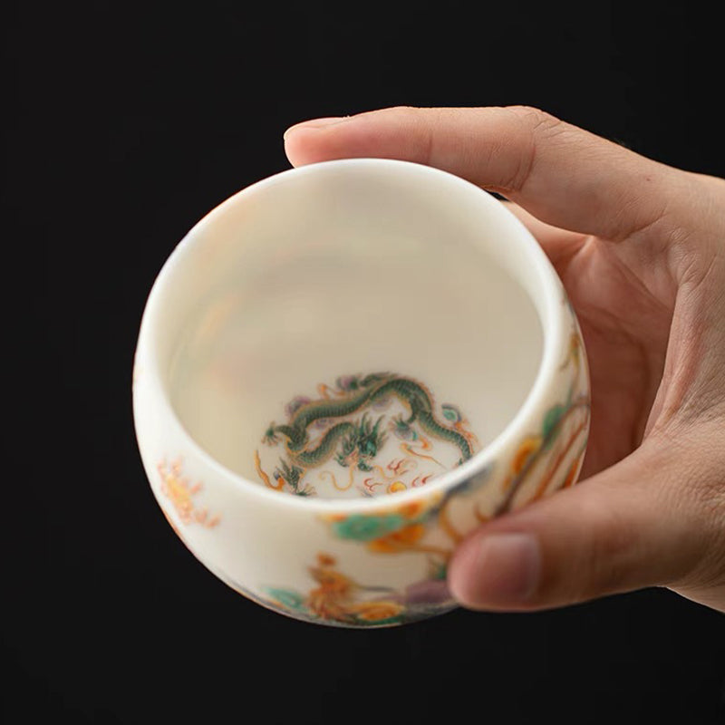 Dragon Phoenix Clouds Ceramic Teacup - Green dragon painting inside cup base with tea, handcrafted