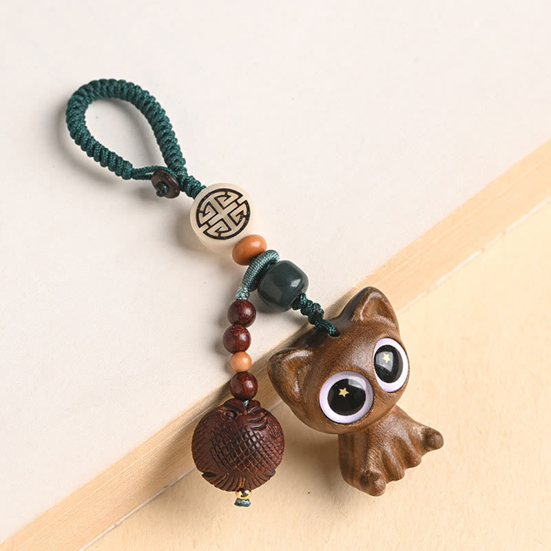 Green Sandalwood Key Chain – hanging from bag, lucky cat and koi fish bag charm