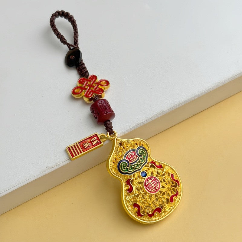 Gold filigree calabash keychain with Chinese knot, cinnabar bead and ruyi plaque, brown cord