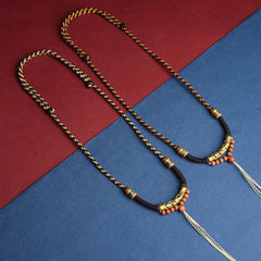 Tibetan King Kong Knot Prayer Wheel Necklace – two pieces on burgundy and blue background, Buddhist jewelry