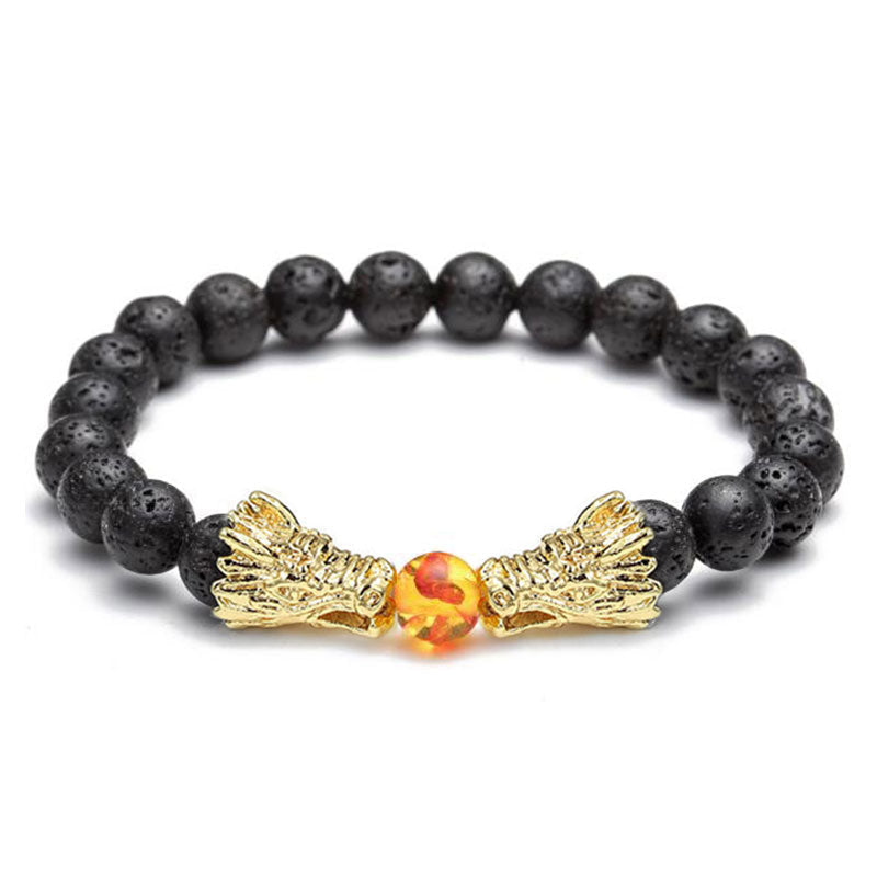 White Turquoise Lava Rock Dragon Bracelet – Lava beads gold dragons amber center slight angle detail, Bold