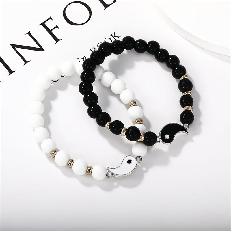 Yin Yang Protection Couple Bracelet - Black onyx and white turquoise beaded bracelets with interlocking yin-yang charms, m... Imagen principal del producto