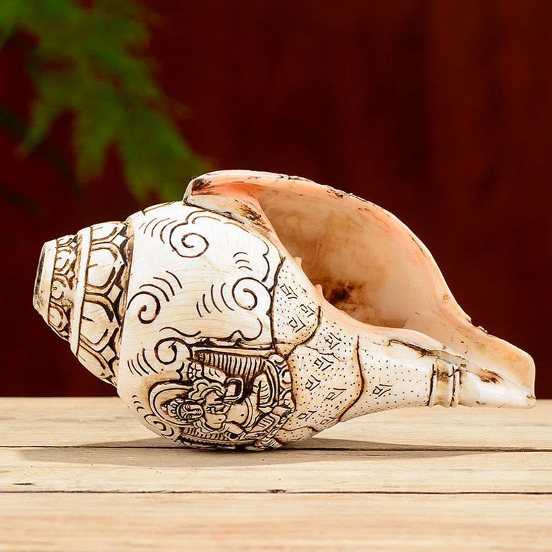 Engraved Shankha Wealth Conch – close-up of wealth vase spilling jewels carving, abundance symbol art